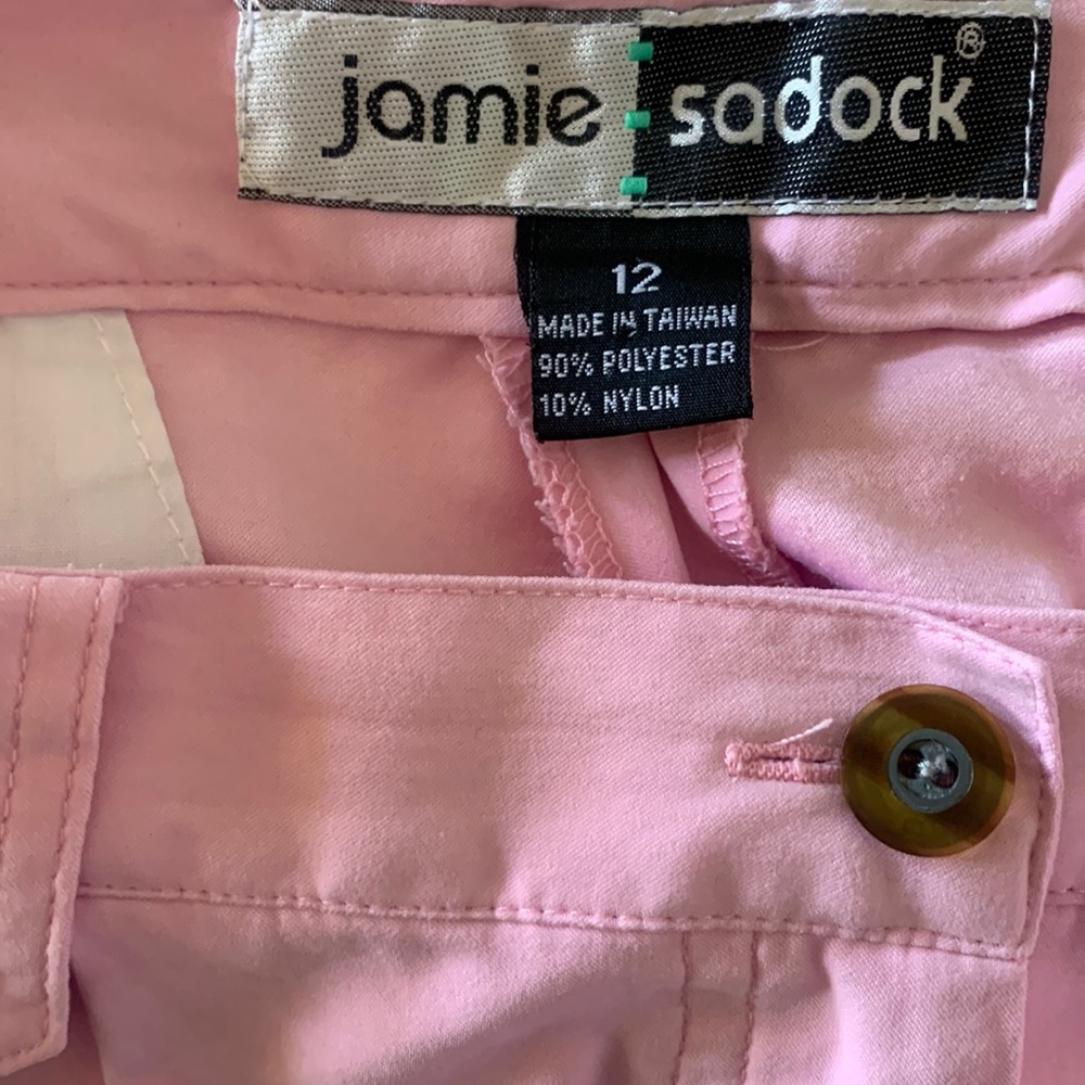 Top pink with grey trim.